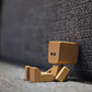 Charmante kleine schaukelnde Holzfigur