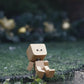 Charmante kleine schaukelnde Holzfigur
