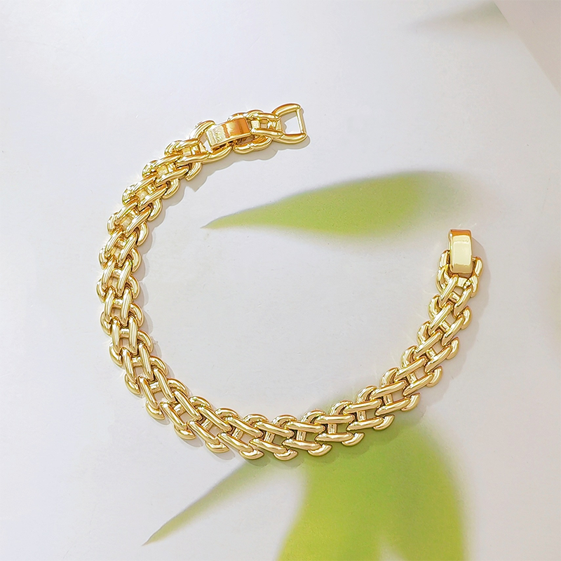 Elegante gouden armband met dubbele rij schakels