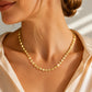 Elegante, vergulde ketting met platte schakels voor dames